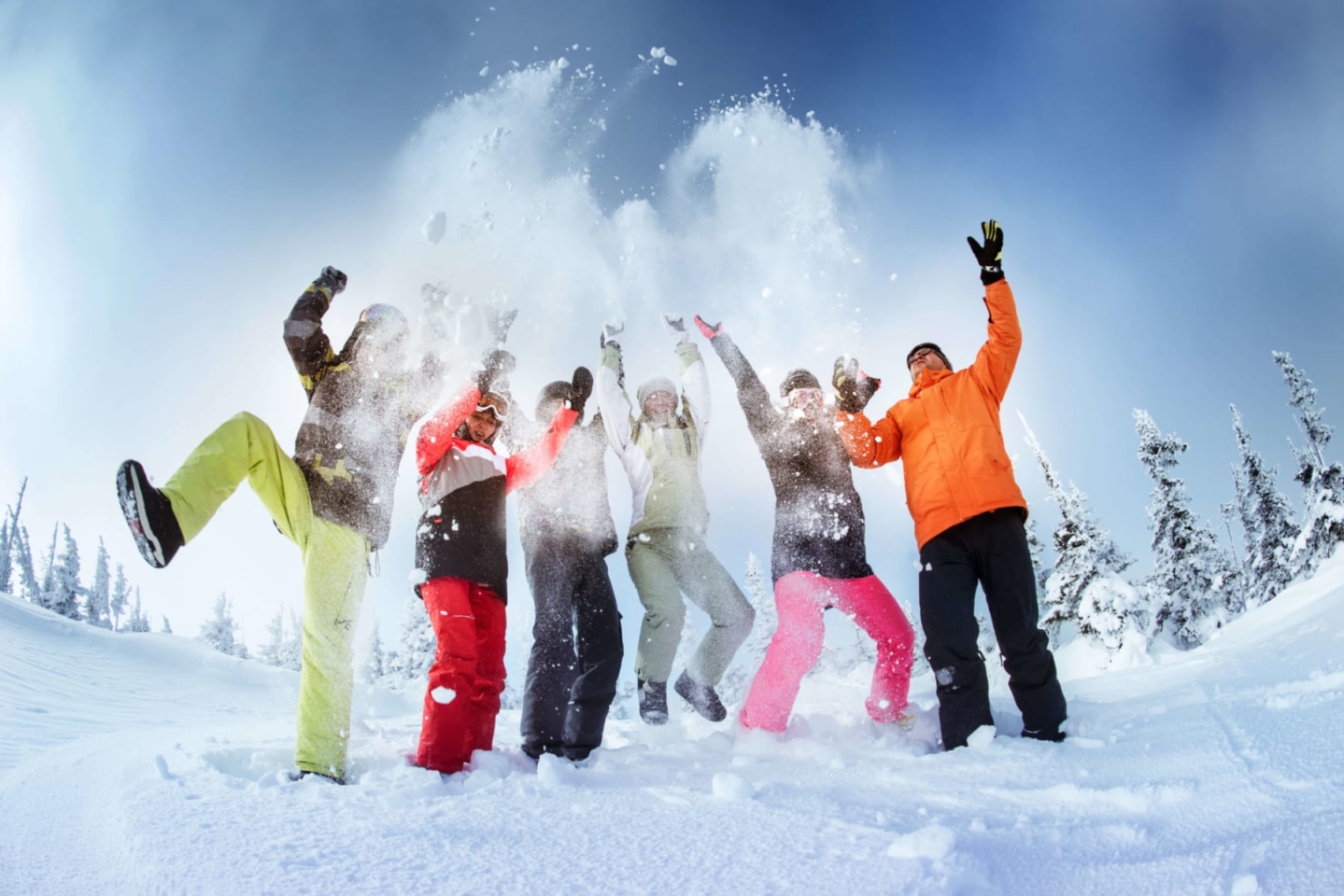 Six people having fun in the snow