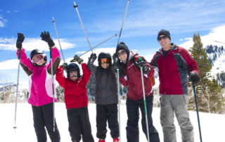 Photo of family enjoying late season skiing at Snowbird in Utah