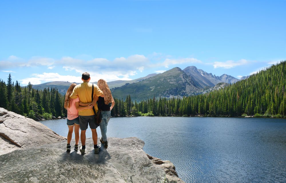 Photo of a family on a mountain hike at Snowbird summer resort