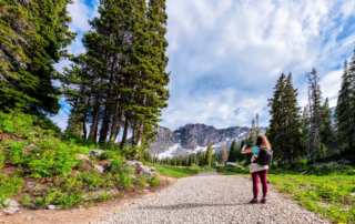 Photo of a person hiking during a Utah summer vacation in Alta-Snowbird