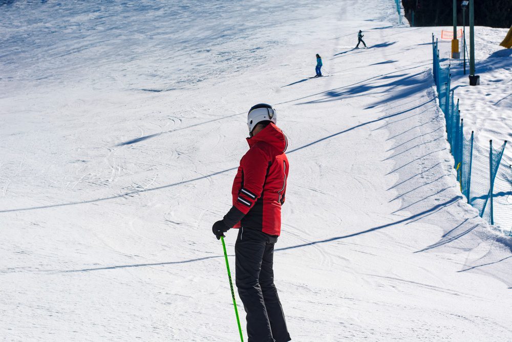 Person skiing at Utah ski resort in Little Cottonwood Canyon